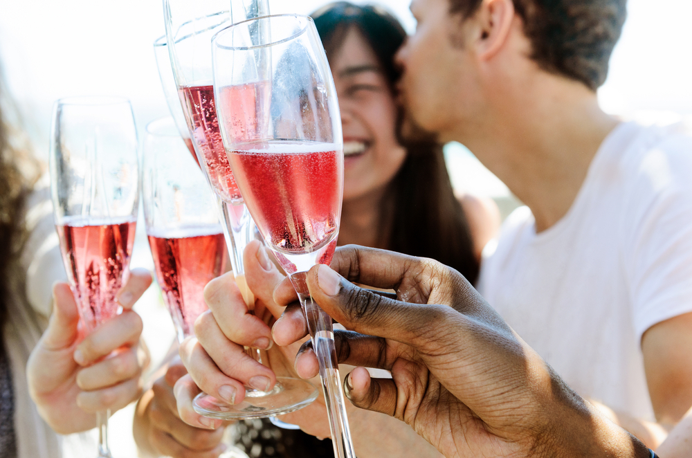 Couple celebrating with friends